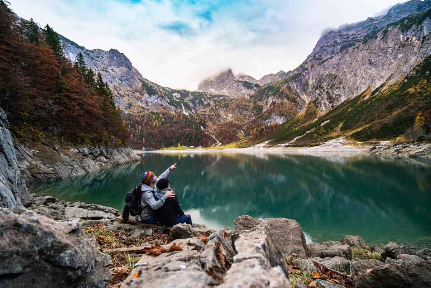 Adventure awaits couple overlooking the mountains