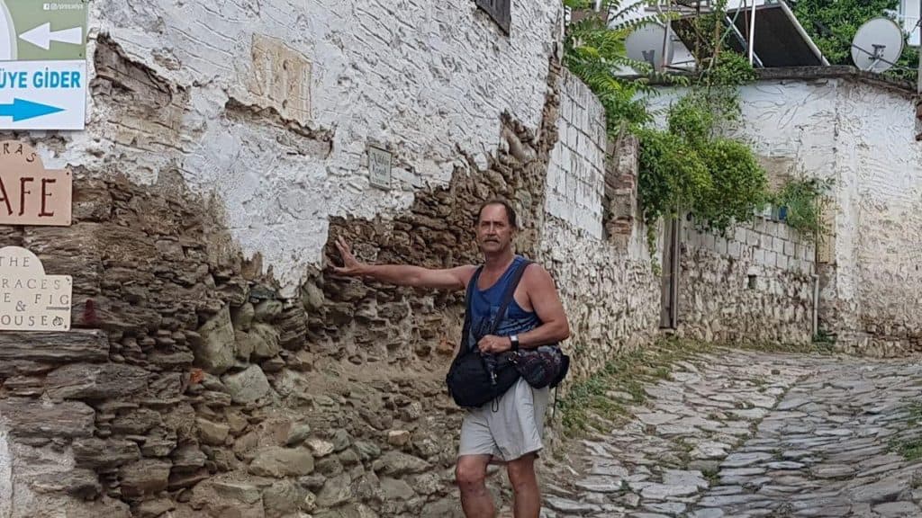 A Tourist in the cobble street of Sirinçe village in Turkey