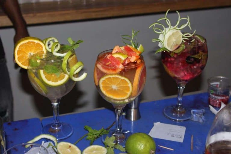 Cocktail bar with a selection of beautifully decorated signature Cocktails decorated with colourful fruits
