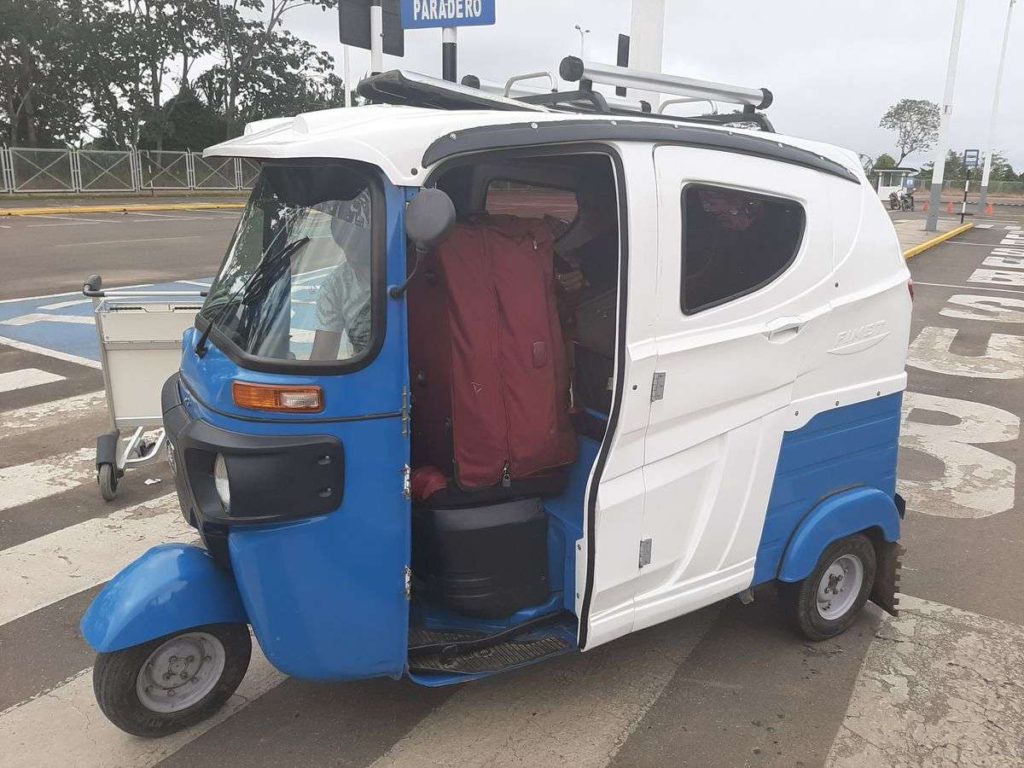 Blue and white Motorcycle-driving taxi at San Juan Airport taxi