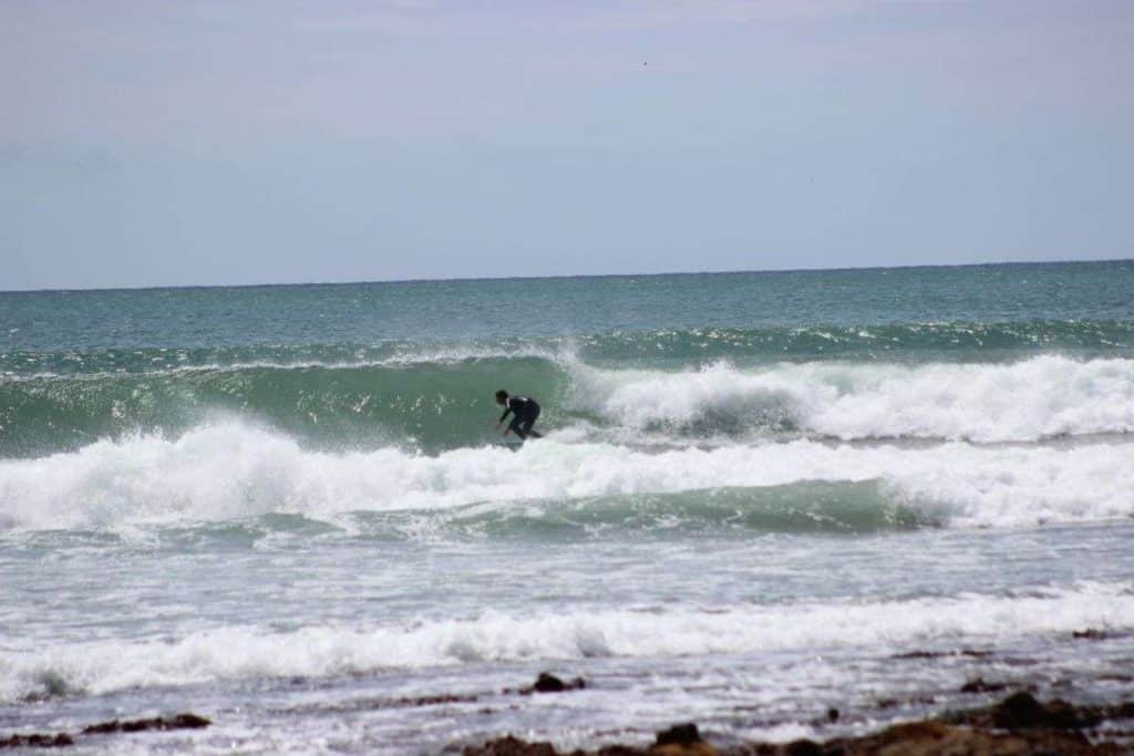 Surfer surfing at Jeffreys Bay