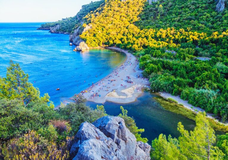 Cirali Olympos, Antalya beach surrounded with lush vegetation and Mountains