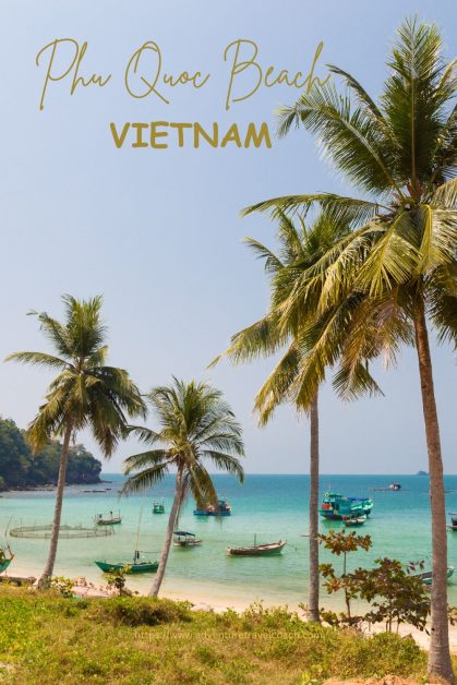 With swaying palms and boats on ocean at Phu Quoc Vietnam