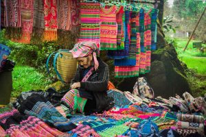Lady with Colourful garments at Northern Vietnam Market #bestmarketsinvietnam
