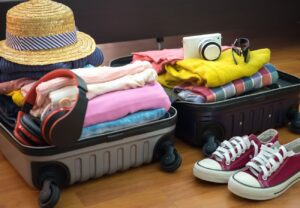 Open suitcase with Womens vacation clothes -packing for southeast asia #PackingforvacationinAsia