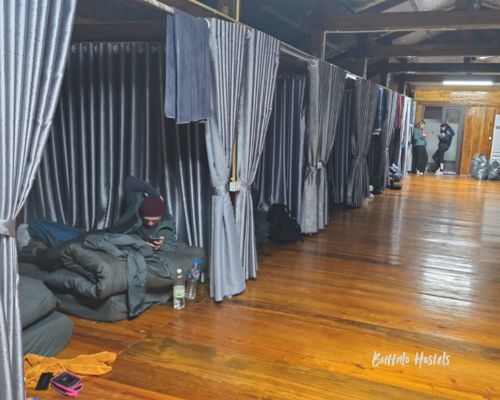 Man relax on his bed in the Buffalo Hostel in Ha Giang #buffalohostels