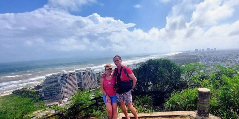 Couple on Marble mountain with Da Nang City overlooking Da Nang City #DaNangCityTour #DaNangVietnam