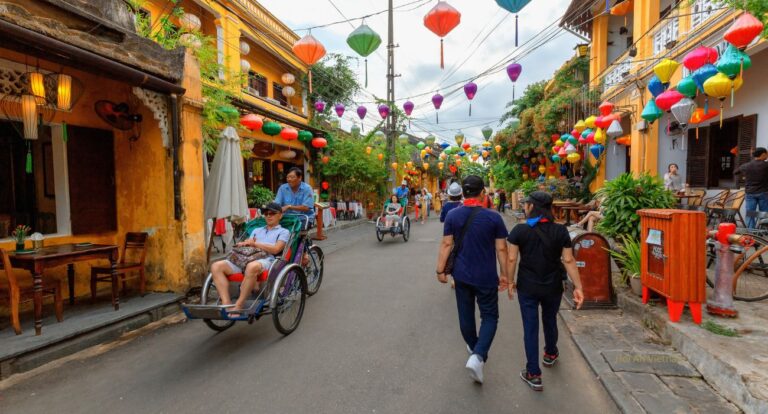 Street view with lanterns of Ancient city of Hoi An Vietnam #BikesHoiAn #BarsHoiAn
